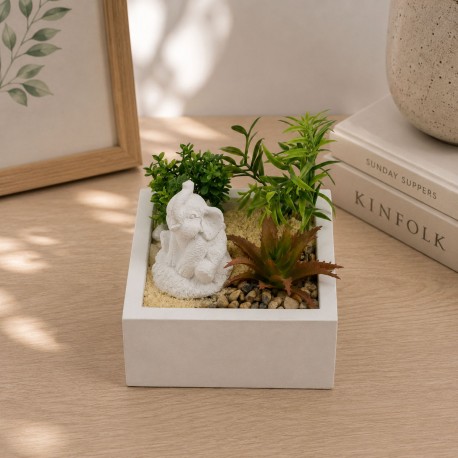POT EN CIMENT AVEC PLANTE ET ÉLÉPHANT